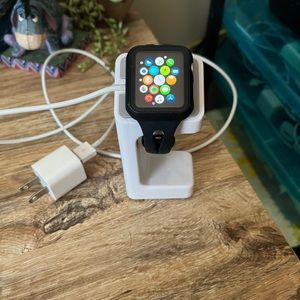 Apple watch Series 1 with lots of accessories